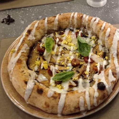 L'evoluzione della pizza, Catania