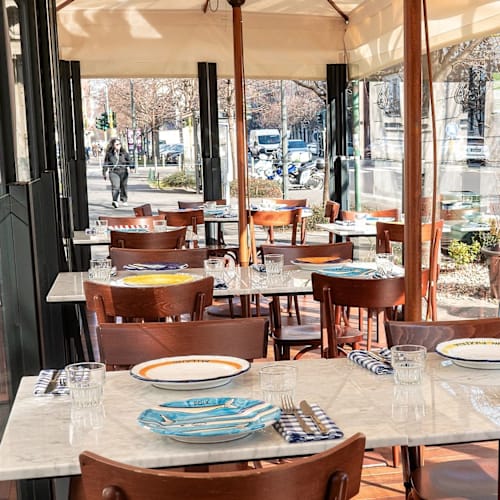 Sciué Washington, Milano