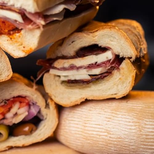 Mangia Calabrese, Roma