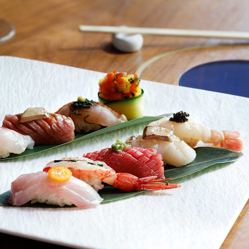 Izu, Milano