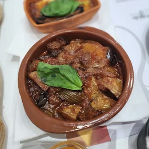 Assettiti e mangia, Bruxelles