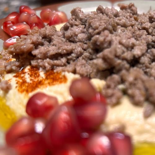 Hommus Como, Como
