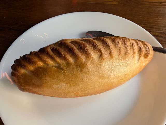 Salteña Martín served warm on a plate
