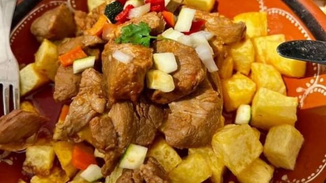 Carne de porco à portuguesa