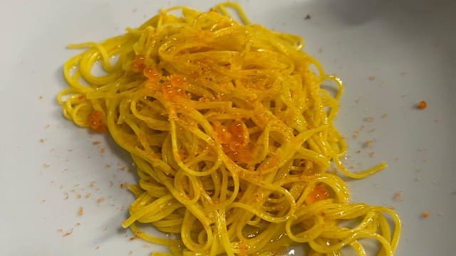 Tarin con bottarga di trota affumicata e perle di trota iridea