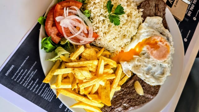 Bitoque (steak meal, with fries, rice and egg)