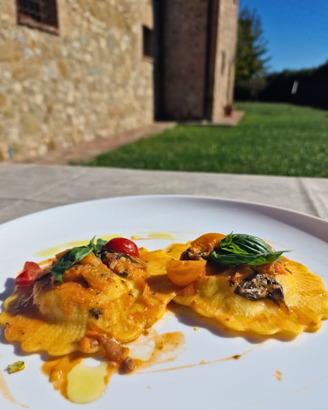 Raviolo fresco di Burrata con Pachini ed Estratto di Basilico 