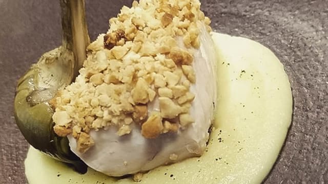 Ricciola in crosta di arachidi, carciofo e purè