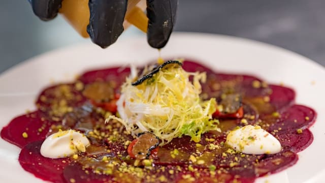 Carpaccio rode biet, sinaasappel, truffel