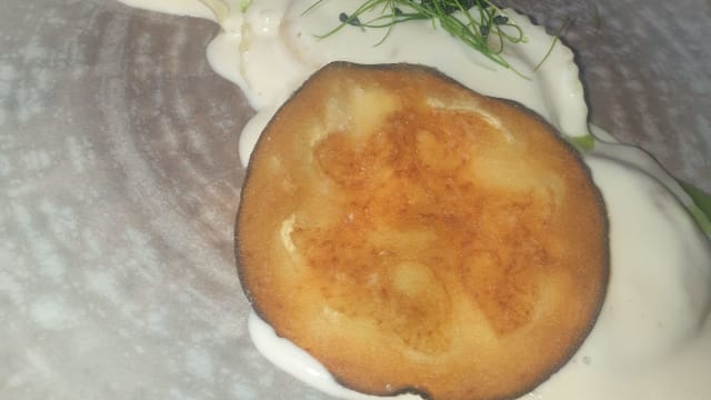 Ravioli ripieni di melanzana con fonduta di parmigiano reggiano