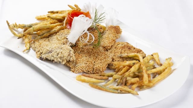 costolette d'agnelli in crosta di sesamo con zucchine croccanti