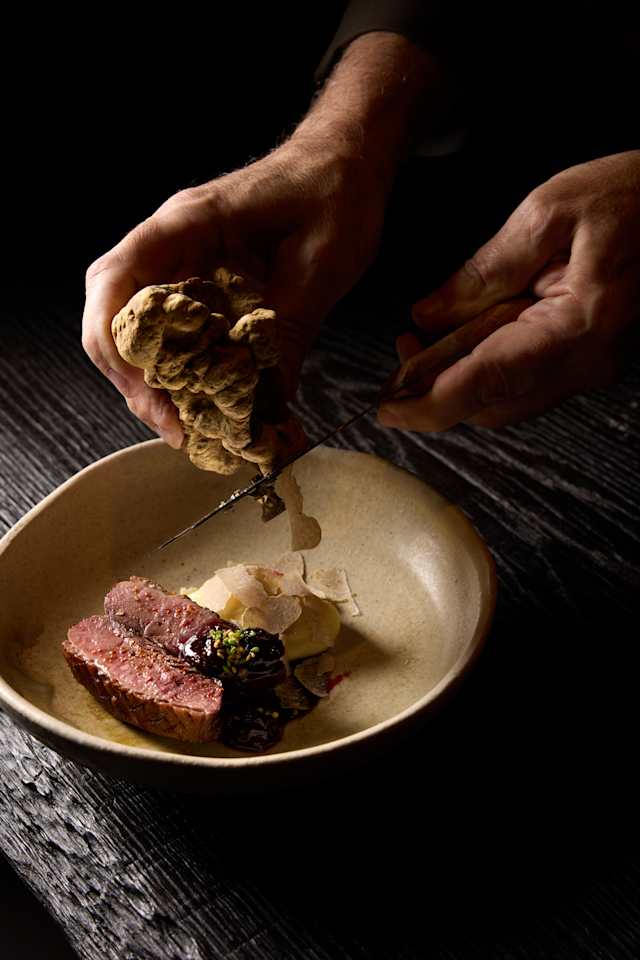 Wild game with fresh white truffle, parsnip cream & beef garum 