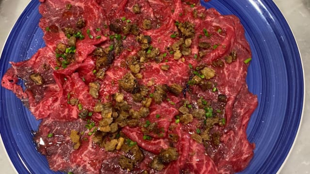 Carpaccio di manzo con ciccioli