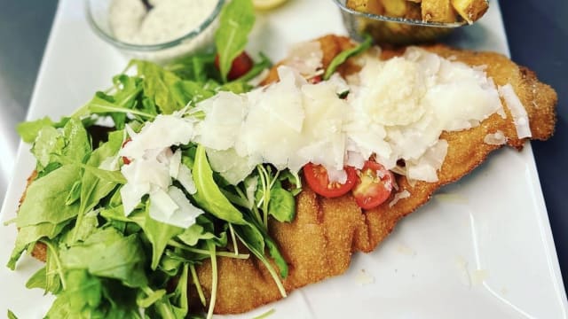 L'Oreille d'éléphant à l'Italienne (Escalope de Veau Pané)