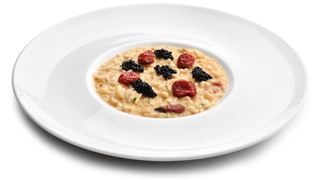 Risotto alla seppia, caviale di aringa e pomodoro confit 