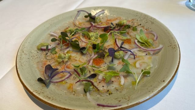 Carpaccio de gambas y cítricos.