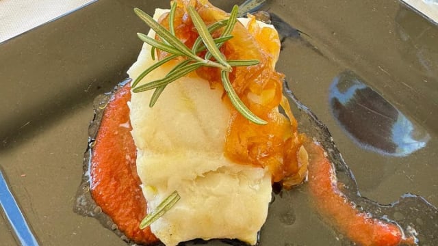 Baccalà con cipolle caramellate