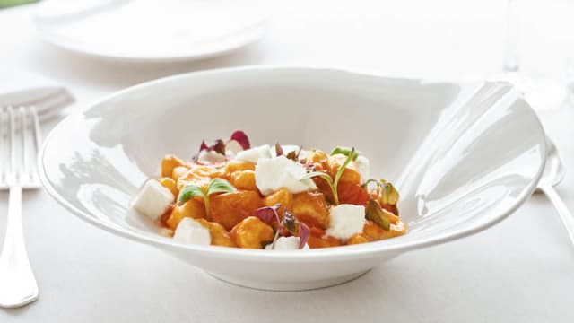 Home-made potato dumplings with fresh tomato and buffalo mozzarella