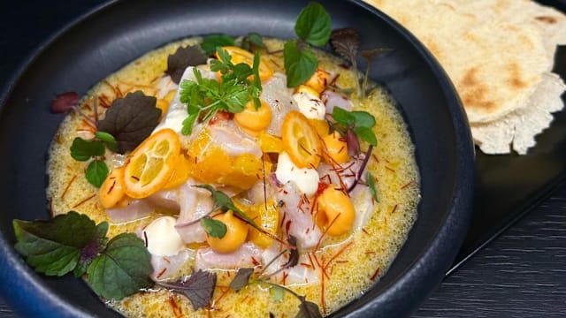Ceviche de corvina con leche de tigre de ají amarillo y  kumquat