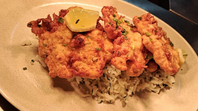 Filetes de peixe galo com arroz de berbigão 
