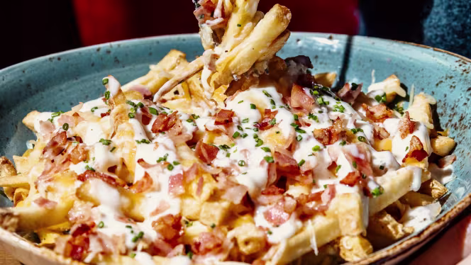 Tony Roma´s - Plaza Norte 2 - 8