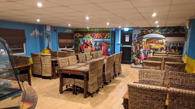 Comie's Caribbean Grill - 7